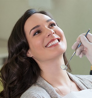 Smiling woman during dental checkup