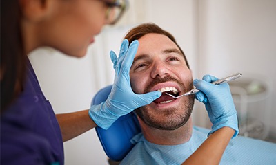 Man receiving dental exam
