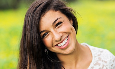 Woman with gorgeous smile outdoors