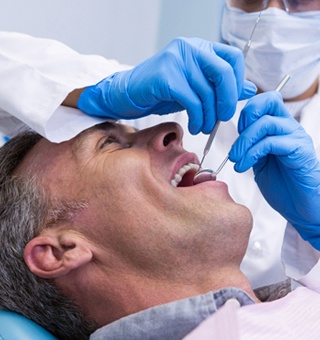 man receiving dental care