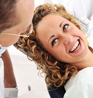 Smiling woman in dental chair