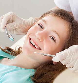 Smiling child in dental chair