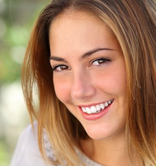 woman smiling outside