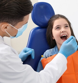 Smiling woman in dental chair