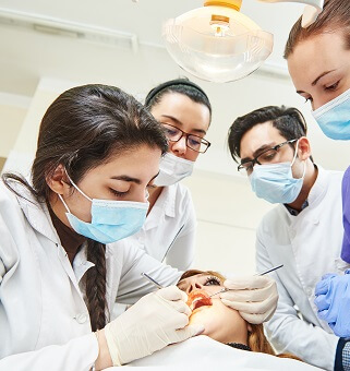 Dentists studying in dental school