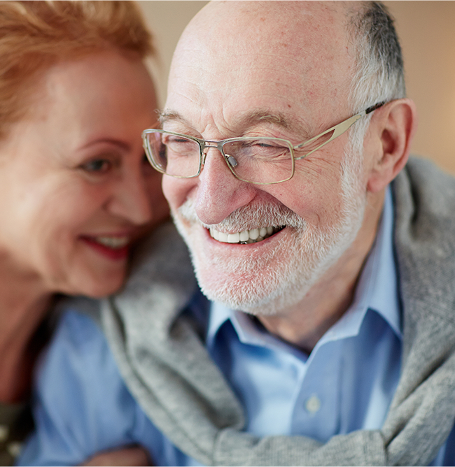 Smiling older man and woman