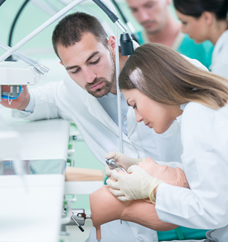 Dentists studying in dental school